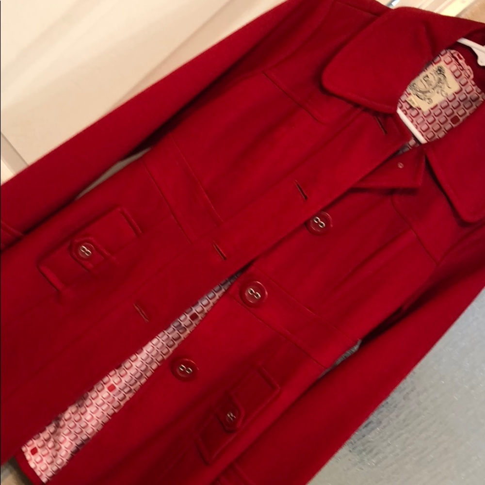 Worn once red jacket .